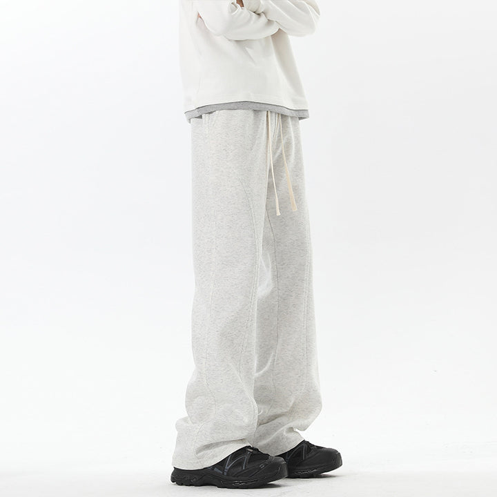 Men's oversized sweatpants in baggy cut with drawstring and decorative seams Mune Fashion