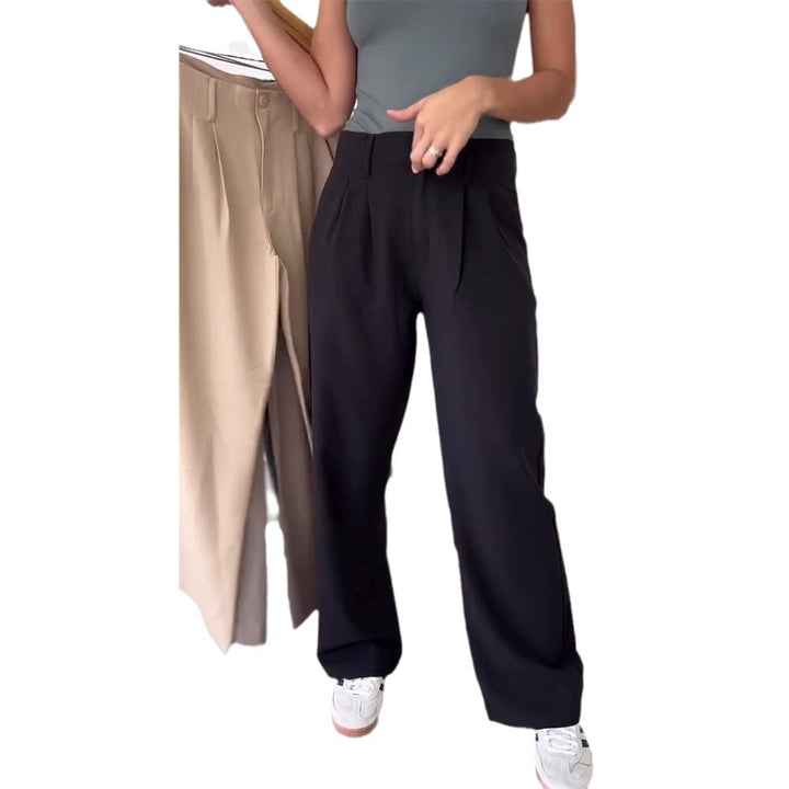 Ladies nan elegant sack-inspired pleated trousers with a high waist fit, straight wide leg, and side pockets Mune Fashion