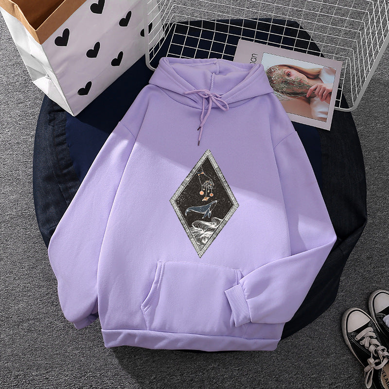 Women's oversized hoodie with sewn whale patch application, kangaroo pocket, and fleece-lined interior Mune Fashion