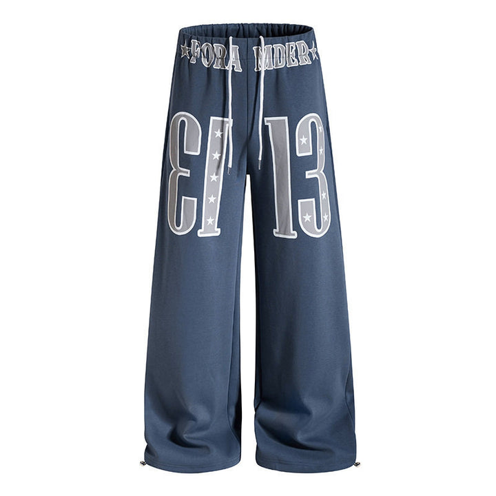Women's Wide Palazzo Jogging Pants with High Comfort Waistband, Drawstring and Large Graphic Front Mune Fashion