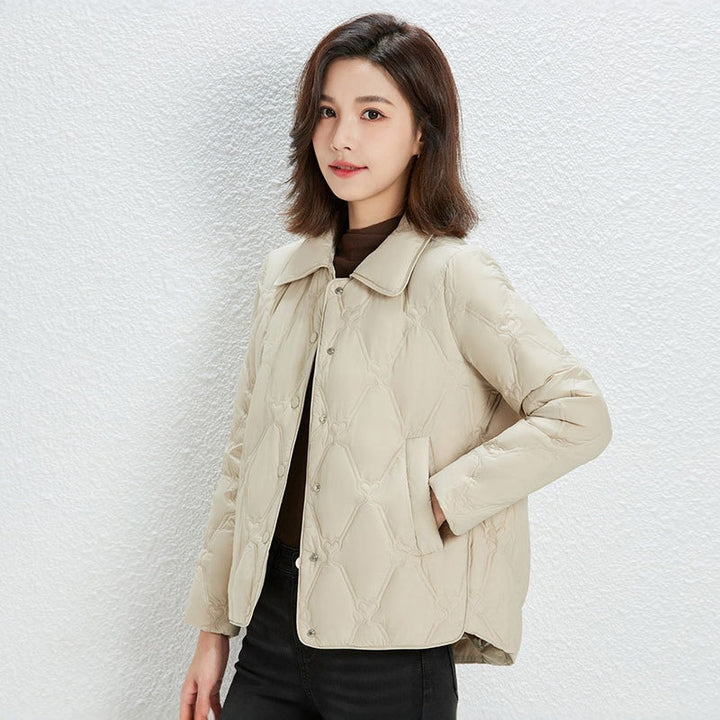 Women Short Cut Quilted Jacket with Decorative Stitching and Rounded Hem Mune Fashion