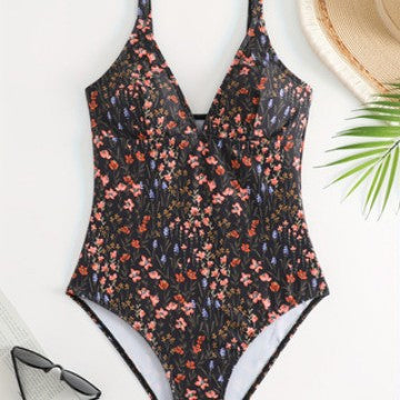 Ladies elegant and body-hugging swimsuit with floral design Mune Fashion