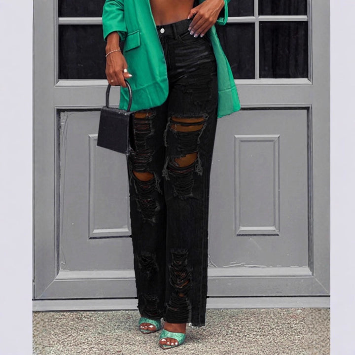 Ladies high-waisted destroyed jeans with wide legs and large knee rips Mune Fashion