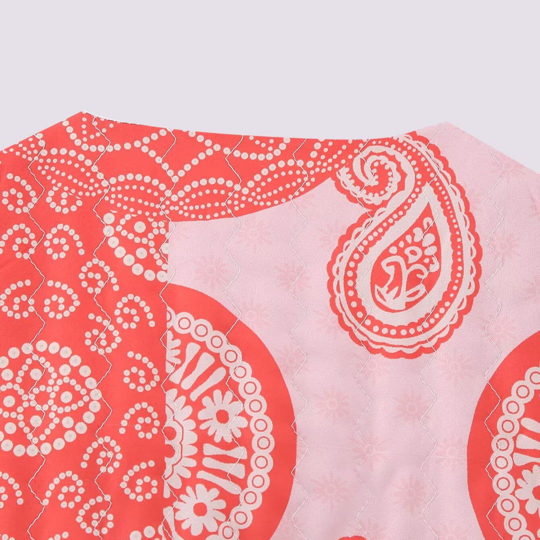 Women's sleeveless short vest with patchwork print, decorative trim and round neckline Mune Fashion