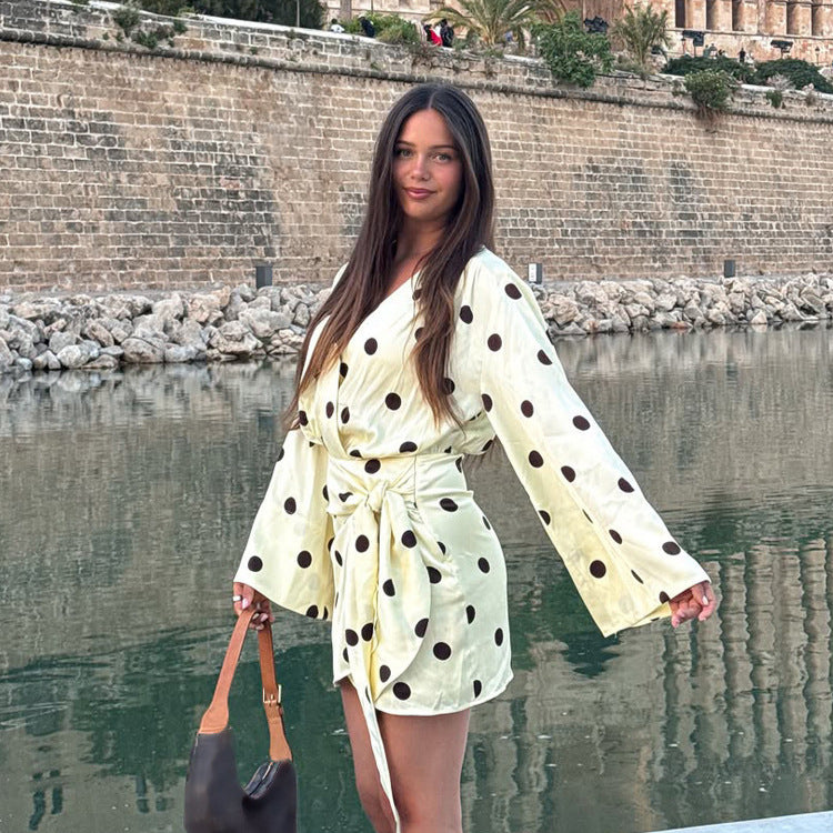 Ladies wrap mini dress with V-neck, bell sleeves and polka dot print Mune Fashion