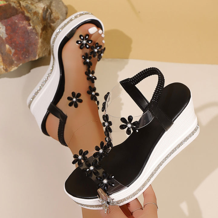 Ladies' platform sandals with transparent PVC strap and floral application Mune Fashion