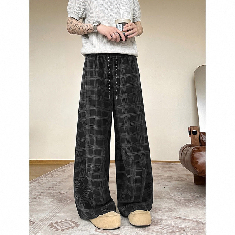 Men's wide checkered lounge pants with elastic waistband and drawstring