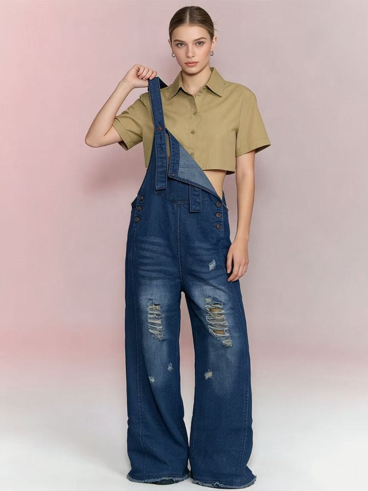 Women's modern baggy overalls made of pigment-dyed stretch denim with adjustable straps and visible rips Mune Fashion