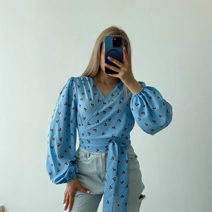 Women's wrap blouse with cherry print, wide puff sleeves & tie belt Mune Fashion