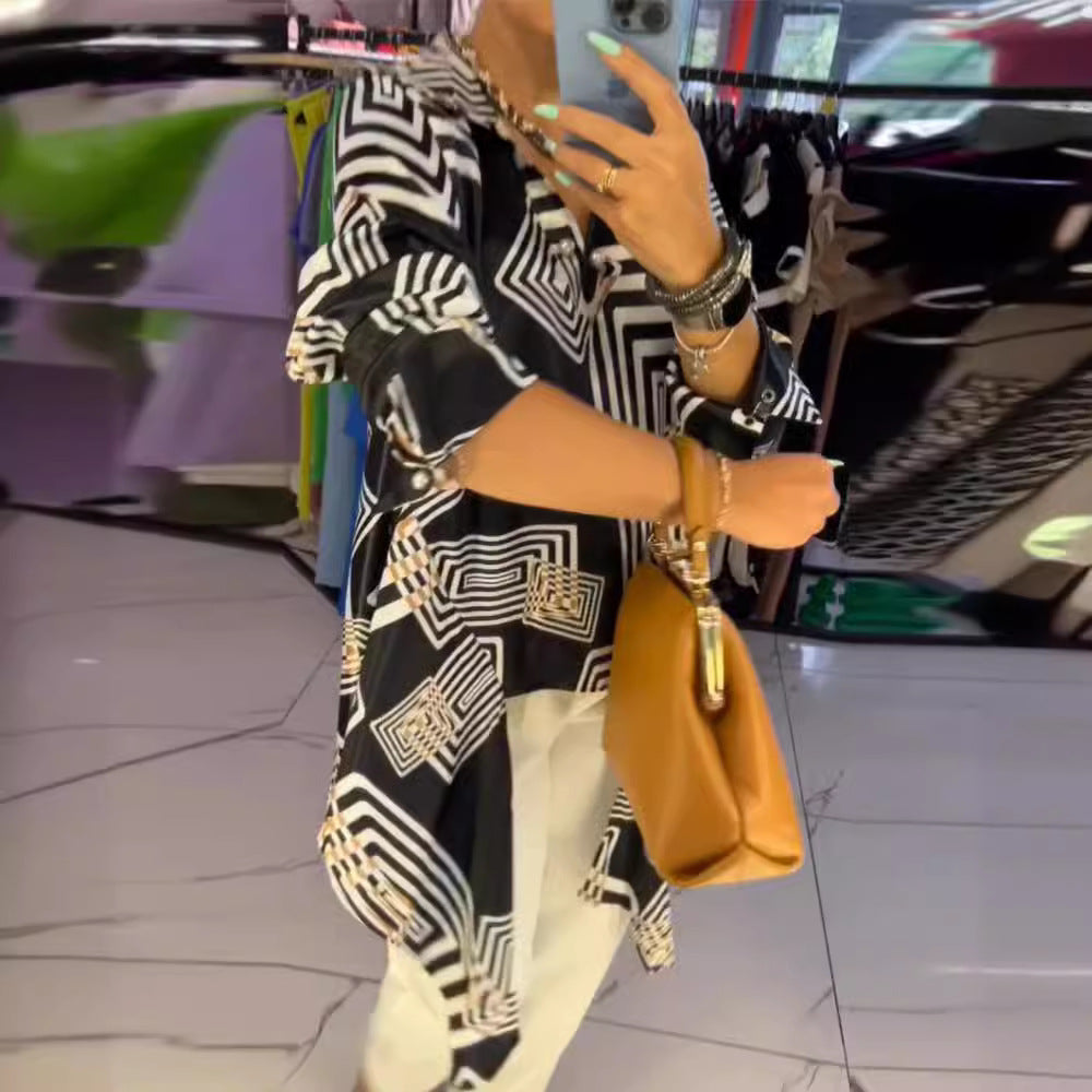 Women’s loose silk-look blouse with graphic square print, asymmetrical hem and mother-of-pearl button placket Mune Fashion
