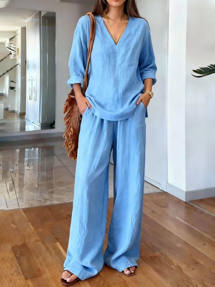 Women's lightweight linen look two-piece set with deep V-neck, loose 3/4 sleeves, and wide palazzo pants cut Mune Fashion