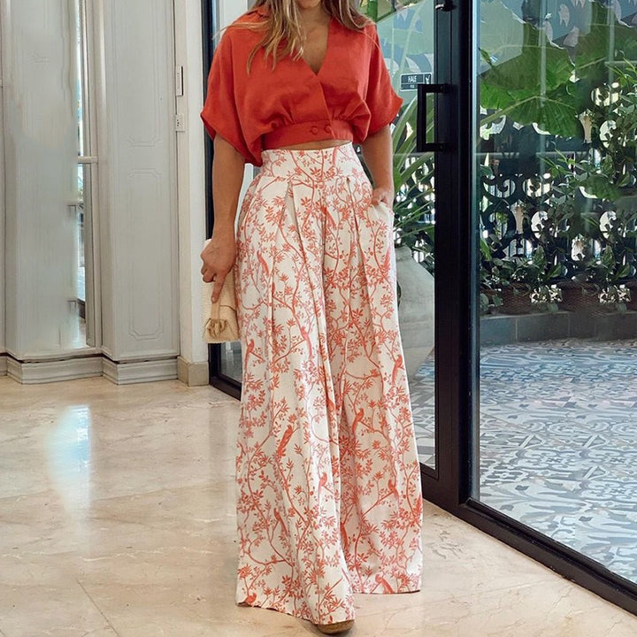 Women Elegant high-waisted palazzo pants with wide leg, pleats and side pockets Mune Fashion