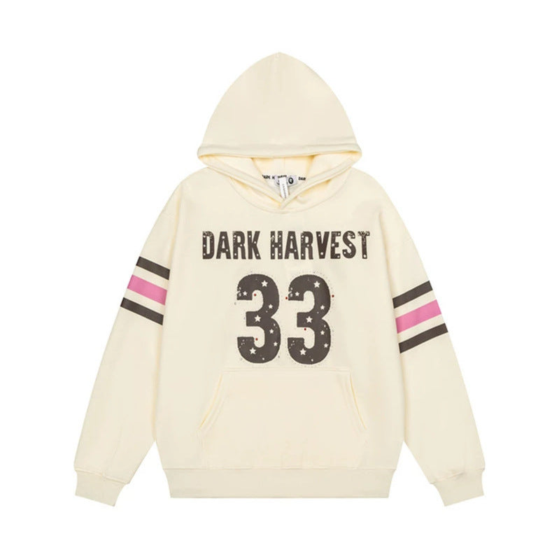 Women's oversized hoodie with vintage number print, studded detailing, and contrast stripes on the sleeves Mune Fashion