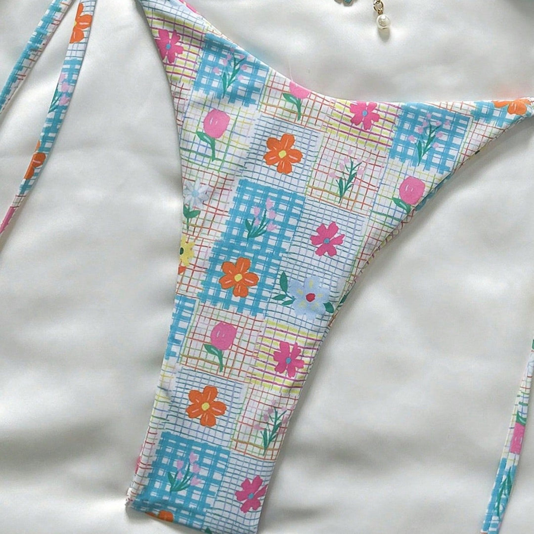Ladies triangle bikini with playful flower details Mune Fashion