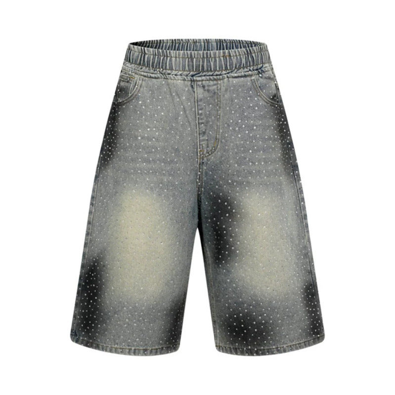 Women's high-waisted denim culotte shorts with comfort waistband and subtle polka dot pattern Mune Fashion