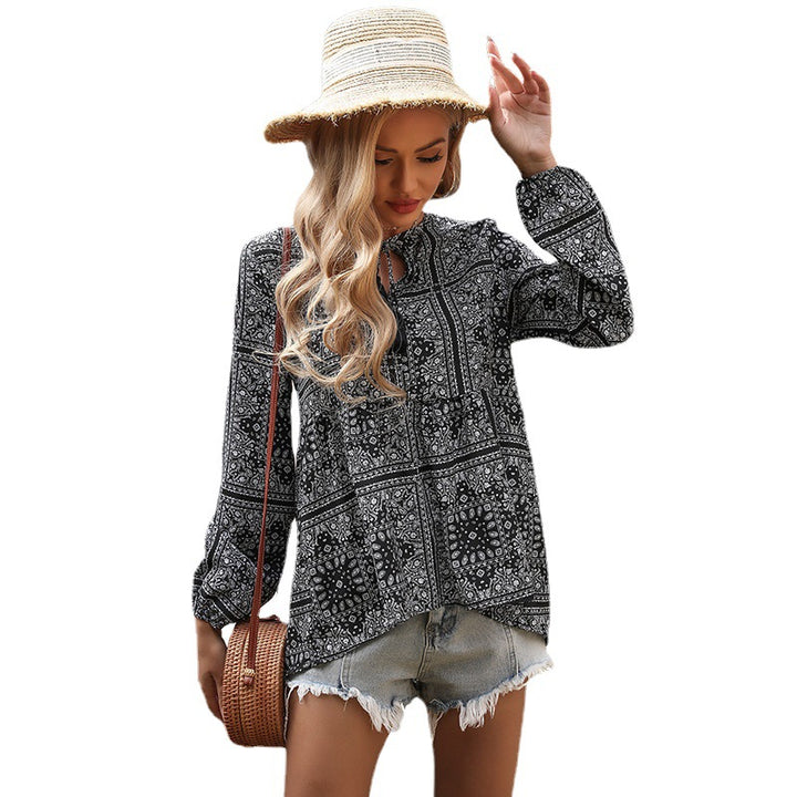 Women's V-neck tunic with paisley bandana print, tassel tie Mune Fashion and tiered skirt Mune Fashion