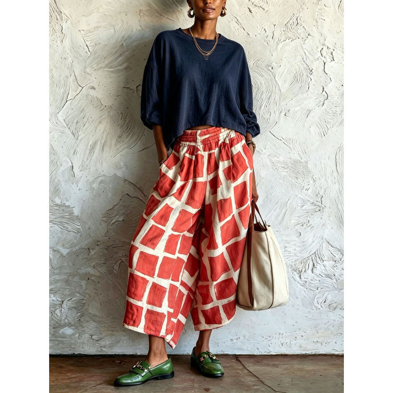 Women's patterned culotte palazzo pants with wide legs, elastic waistband, and side pockets