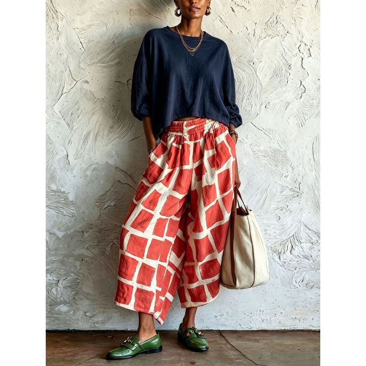 Women's patterned culotte palazzo pants with wide legs, elastic waistband, and side pockets