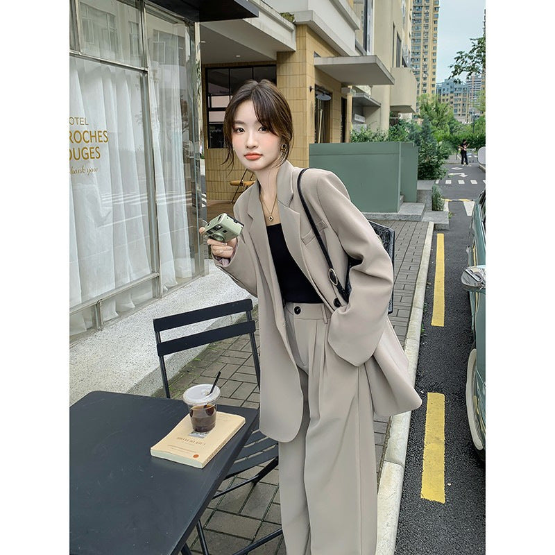 Women's Oversize two-piece made of flowing crepe with lapel blazer and wide pleated trousers Mune Fashion