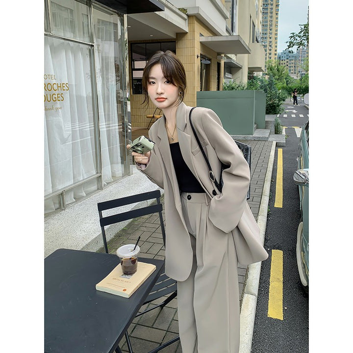 Women's Oversize two-piece made of flowing crepe with lapel blazer and wide pleated trousers Mune Fashion