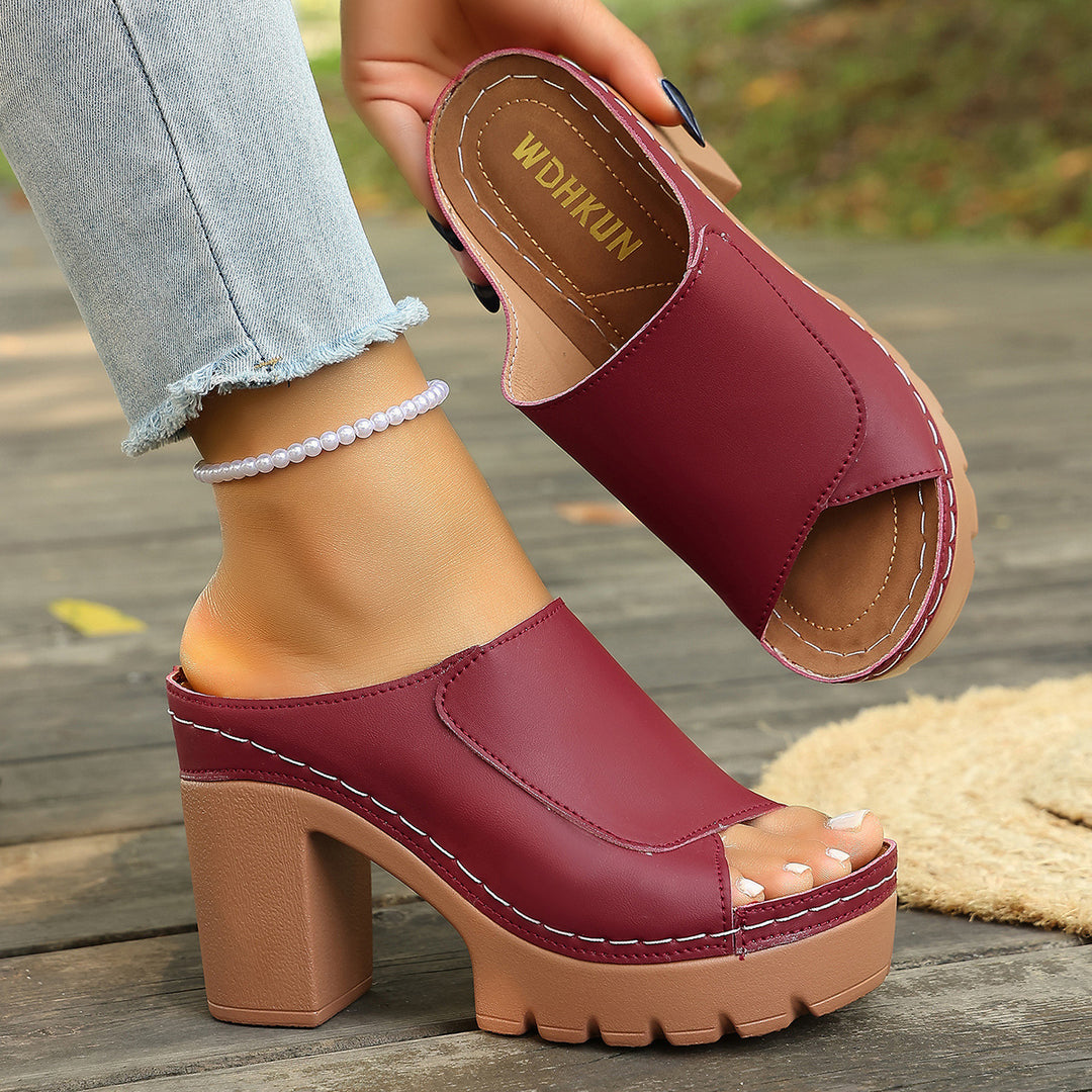 Women's platform mule with thick profiled sole, open toe area and block heel Mune Fashion