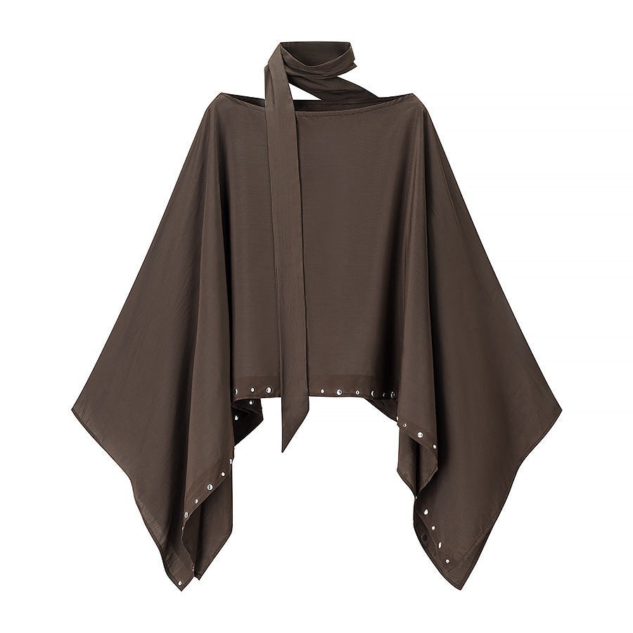Women’s flowing cape poncho with bow, asymmetrical pointed hem and eyelet trim Mune Fashion