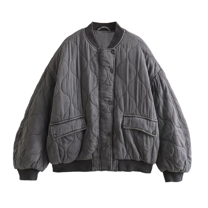 Women's quilted bomber jacket with oversized silhouette, ribbed cuffs, and flap pockets Mune Fashion