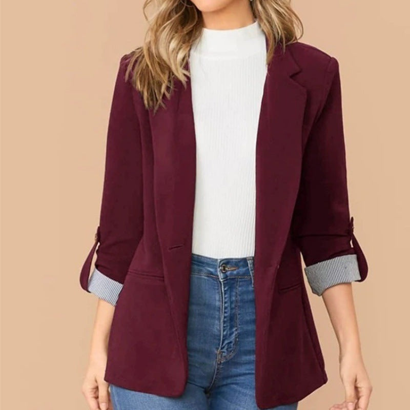 Ladies slim fit blazer with three-quarter sleeves and rolled cuffs Mune Fashion