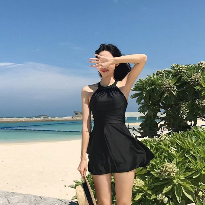Women's swim dress with elegant X-strap design Mune Fashion