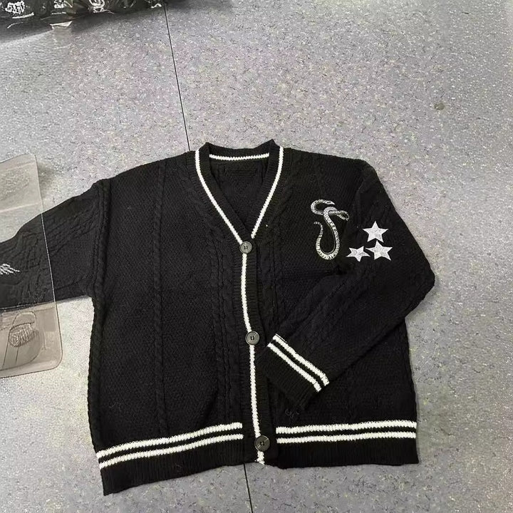Ladies knitted college cardigan with cable pattern, V-neck, contrast stripes and embroidered appliqués Mune Fashion