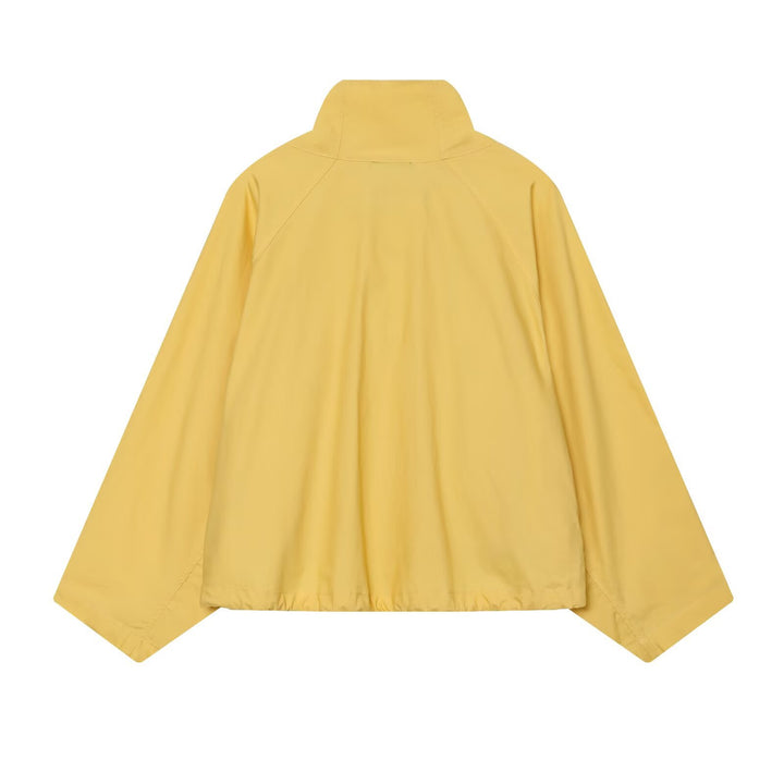 Women's short water-repellent transitional jacket with wide raglan sleeves and drawstring hood