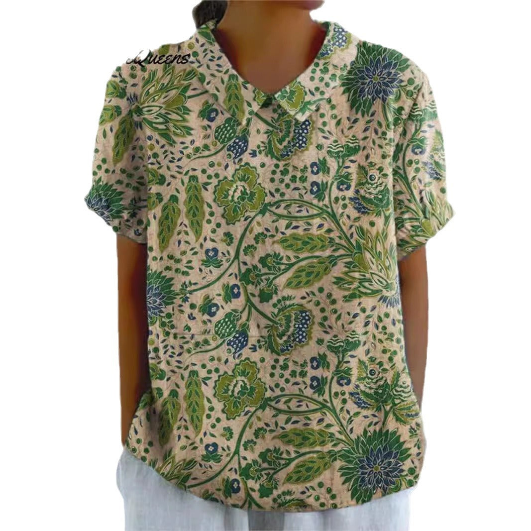Women's casual short-sleeve blouse with V-neck, rounded hem, and botanical all-over print Mune Fashion