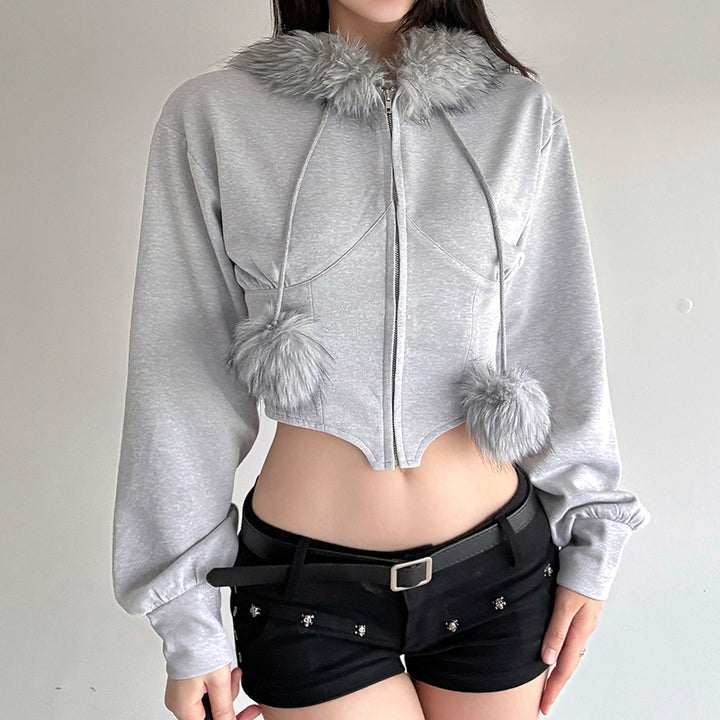 Women's cropped hoodie sweatshirt with faux fur trim, zipper, and pom-pom cords Mune Fashion