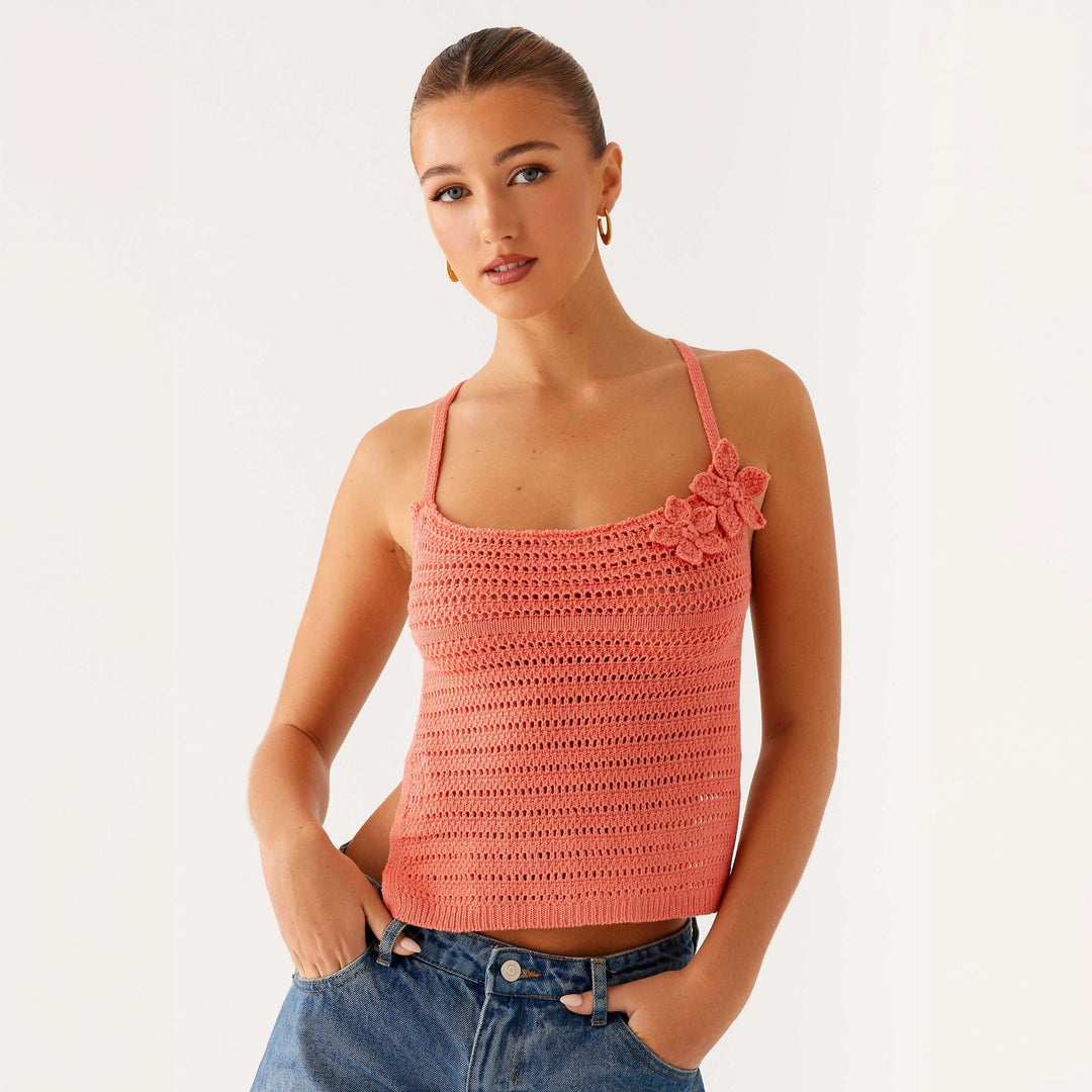 Women crochet top with floral accents Mune Fashion