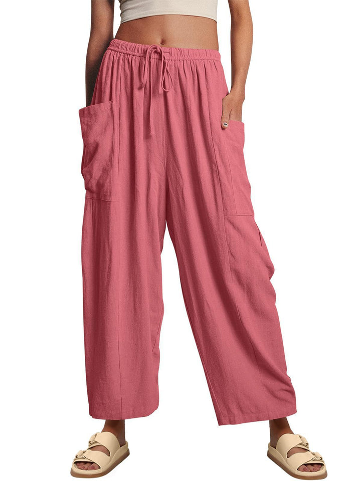 Women's wide palazzo pants made from a lightweight linen blend with drawstring and side pocket Mune Fashion