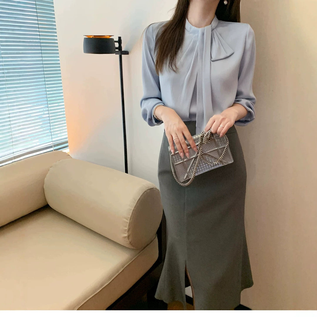Women Elegant and figure-hugging blouse with bow detail Drune