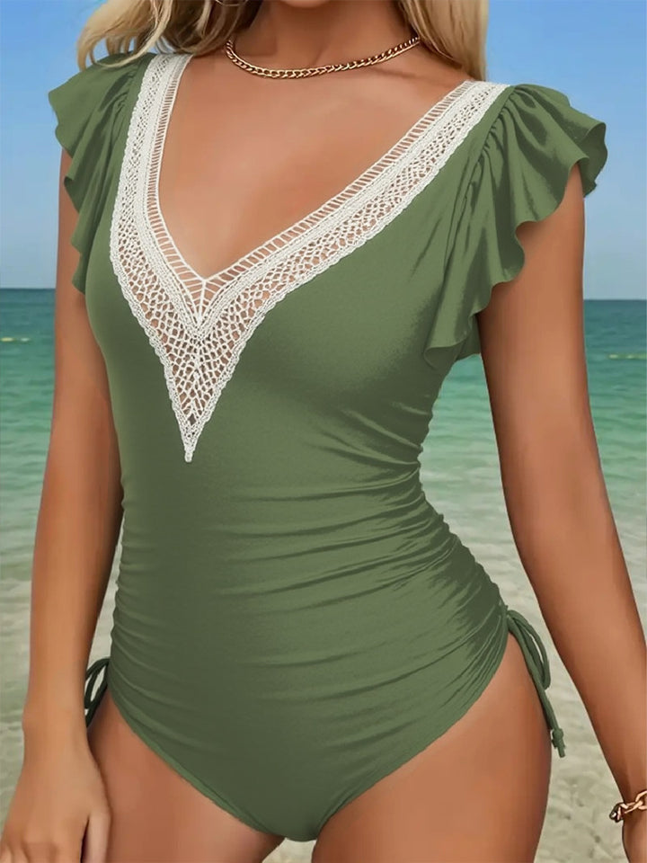Ladies one-piece swimsuit with sophisticated lace and ruffle details Mune Fashion