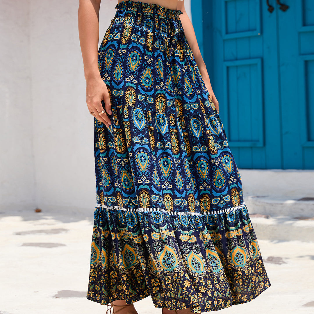 Women's maxi skirt in boho style with tiers, gathered elastic waistband and paisley print Mune Fashion