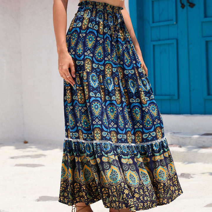 Women's maxi skirt in boho style with tiers, gathered elastic waistband and paisley print Mune Fashion