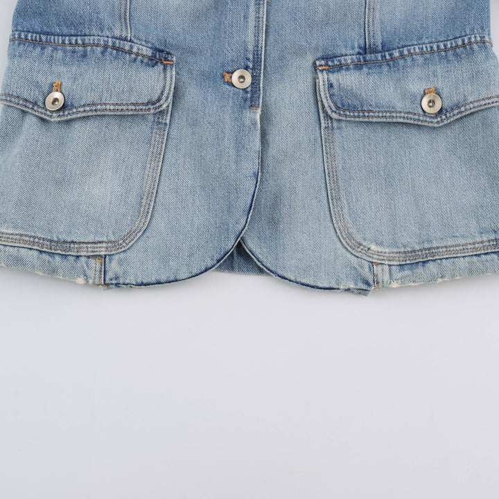 Women's lightweight denim jacket with stand-up collar, shoulder flaps, and four flap pockets Mune Fashion