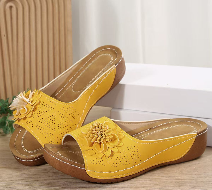 Women's Perforated Wedge Sandals as Slip-On with Flower Application and Padded Footbed Mune Fashion