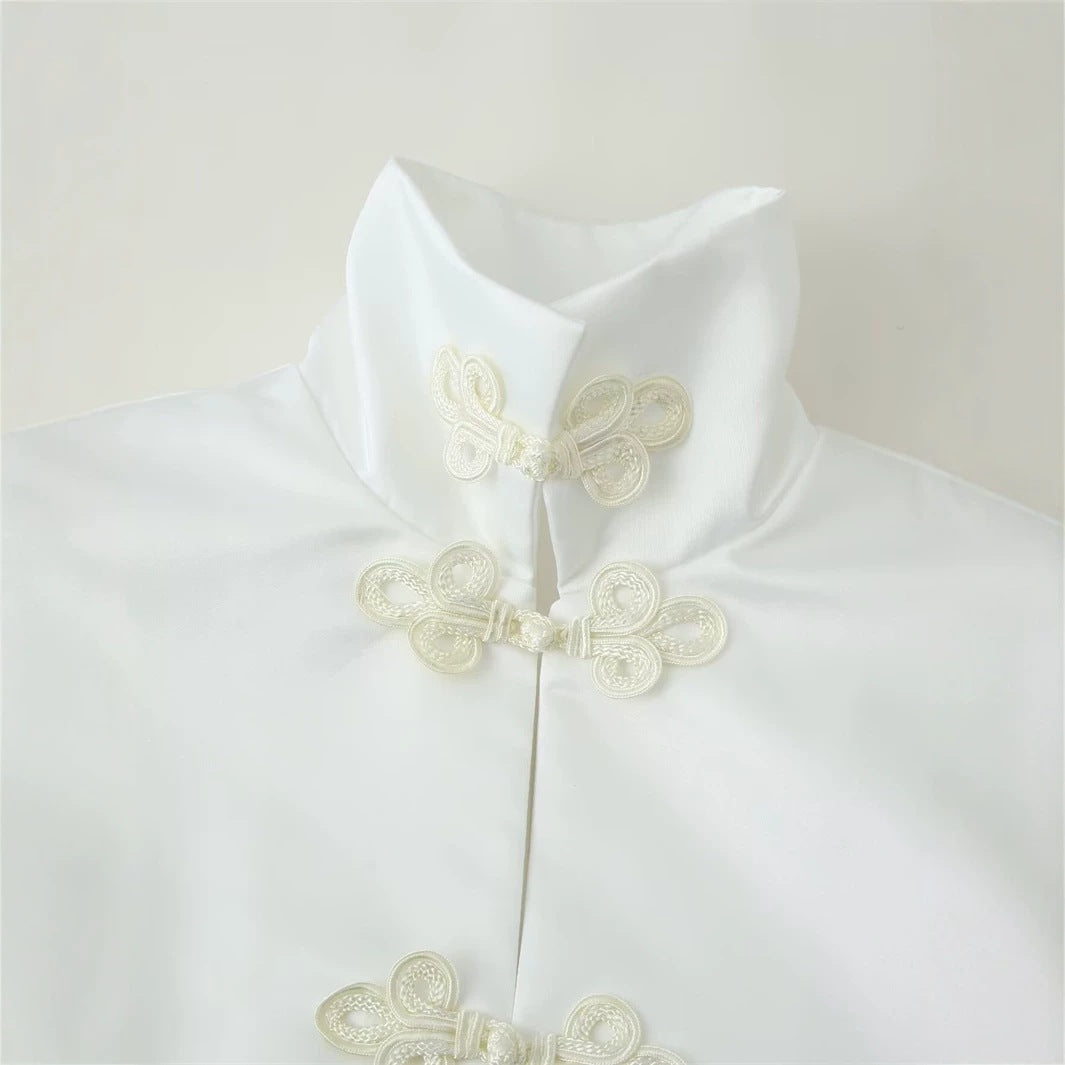 Women's short jacket with stand-up collar and decorative knot closures in Mandarin style Mune Fashion