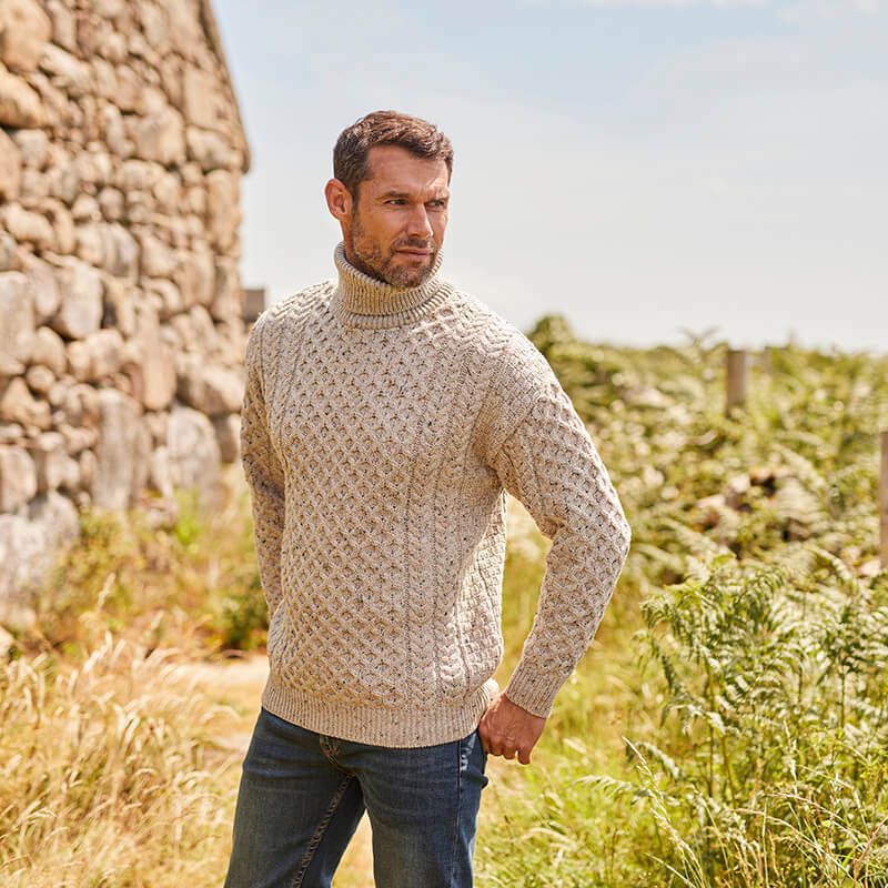 Men's knit pullover with stand-up collar and cable pattern