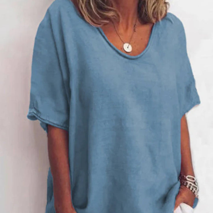 Women's loosely cut linen blend relaxed shirt with round neck, dropped sleeves and side slits Mune Fashion