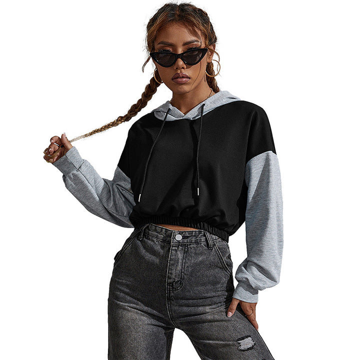 Ladies short cut cropped hoodie with color block sleeves, drawstring and elastic hem Mune Fashion