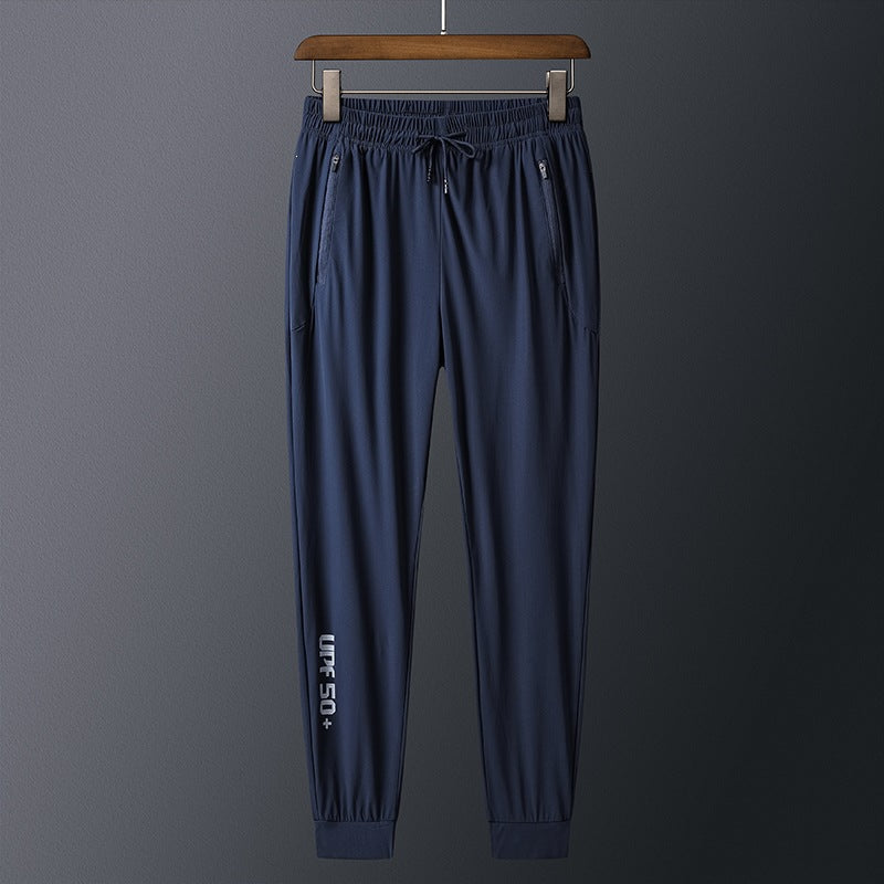 Men's sporty training pants with practical zip pockets Mune Fashion