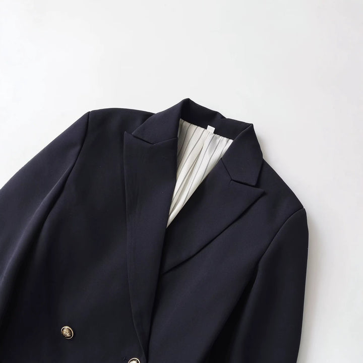 Ladies double-breasted long blazer with distinctive gold buttons and structured shoulder Mune Fashion