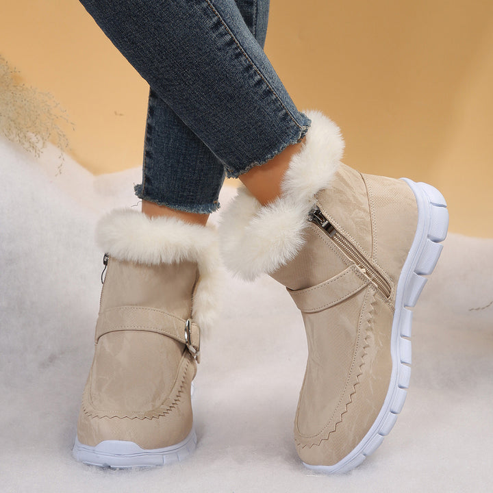 Women's non-fleece short boots with faux fur trim, suede leather look, side zipper, decorative metal buckle, and profiled lightweight sole Mune Fashion