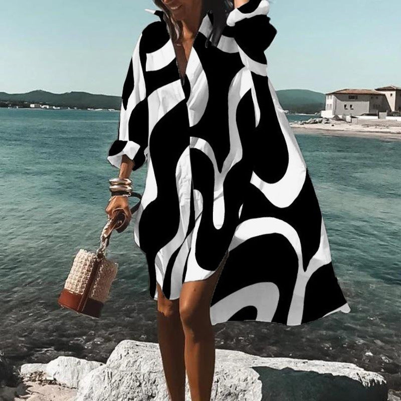 Women's airy beach dress kaftan with tropical leaf print and wide cut Mune Fashion