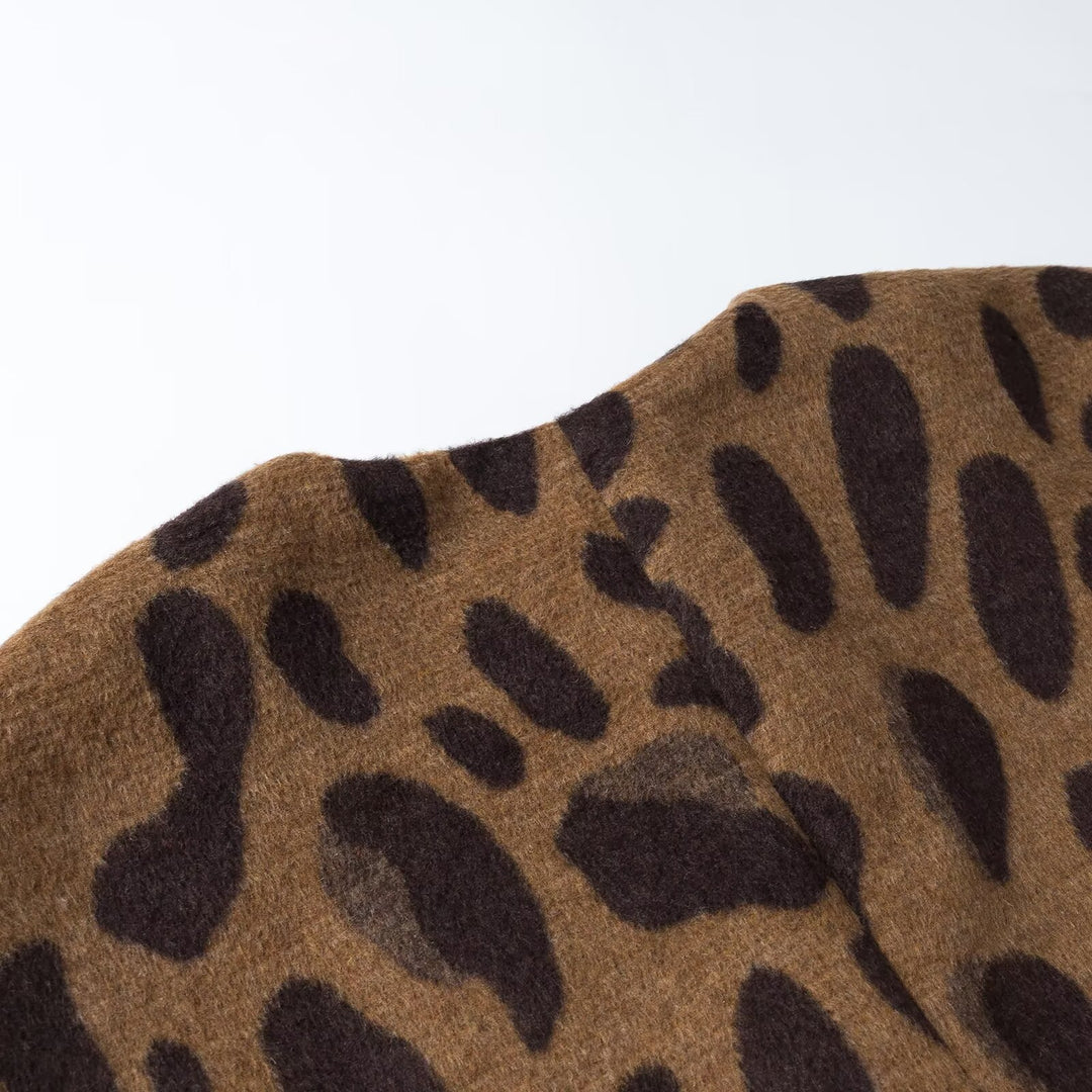 Ladies sleeveless wool blend vest in leopard print with V-neck and decorative button Mune Fashion
